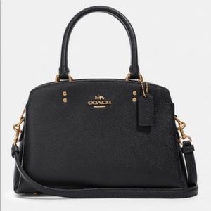 New barely used Medium Sized Coach bag